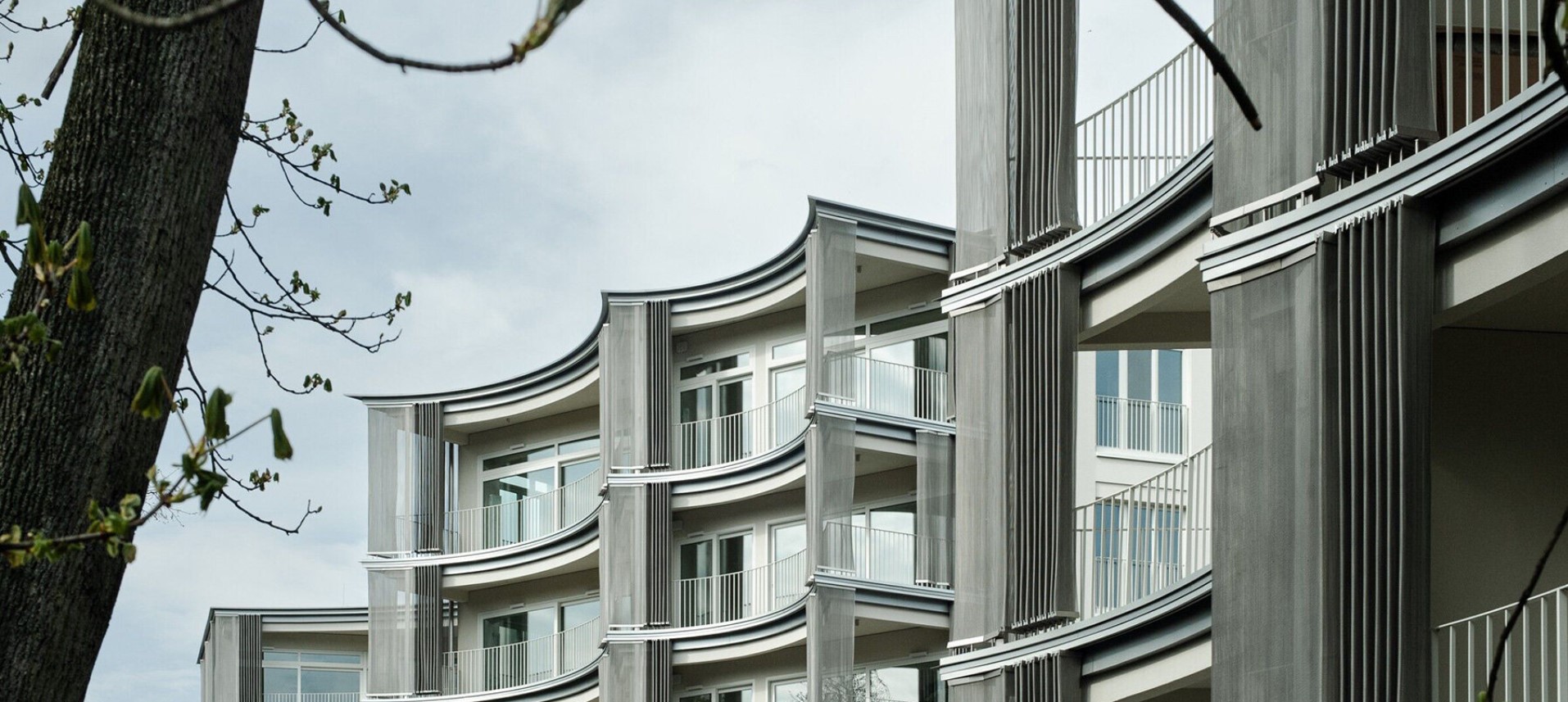 scalloped facade shapes polands perfumiarnia apartments by jems architekci - 17030